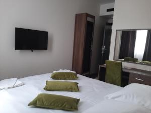 Postel nebo postele na pokoji v ubytování Hotel Usce