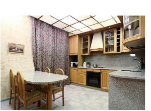 Una cocina o zona de cocina en ApartLux Belorusskaya Suite