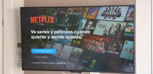 a television screen with a netflix website on it at Hotel Apartamento Bajamar in Las Palmas de Gran Canaria