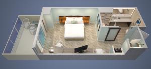 a floor plan of a bedroom with a bed and a desk at Zota Beach Resort in Longboat Key