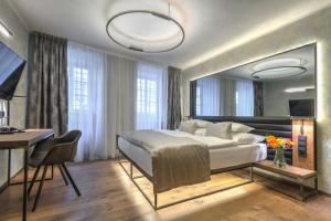 Ένα ή περισσότερα κρεβάτια σε δωμάτιο στο Hotel Waldstein