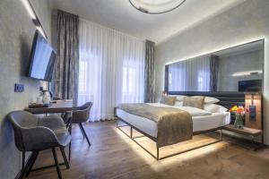 Letto o letti in una camera di Hotel Waldstein