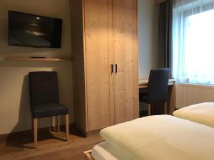 Postel nebo postele na pokoji v ubytování Platzerhof