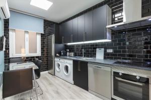 Kuchyň nebo kuchyňský kout v ubytování Plaza Mayor Apartment