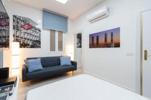 Postel nebo postele na pokoji v ubytování Plaza Mayor Apartment