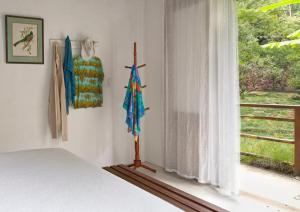 Cama ou camas em um quarto em O Sitio - Ilha Grande
