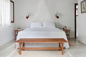 Cama ou camas em um quarto em O Sitio - Ilha Grande