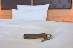 
Ein Bett oder Betten in einem Zimmer der Unterkunft Hotel Kammerer
