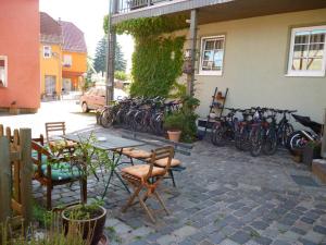 a group of bikes parked next to a building at Landhauspension Rank in Bad Berka