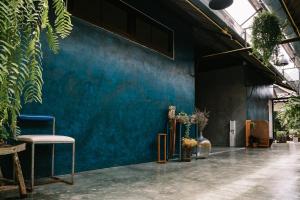 Ein Sitzbereich in der Unterkunft Baannokhook Home&Cafe