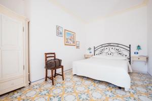 Postel nebo postele na pokoji v ubytování B&B Orto Paradiso