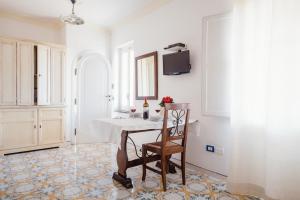TV a/nebo společenská místnost v ubytování B&B Orto Paradiso