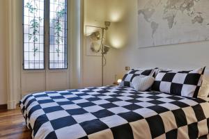 A bed or beds in a room at Casagrande 1920