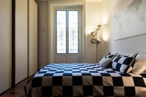 A bed or beds in a room at Casagrande 1920