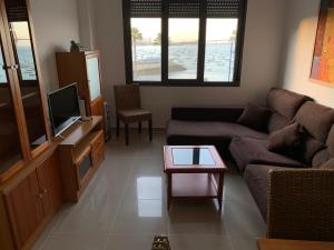 TV a/nebo společenská místnost v ubytování Apartamento Aqua Vitae