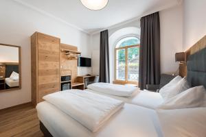 Voodi või voodid majutusasutuse Hotel Plankenhof B&B toas