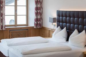 Voodi või voodid majutusasutuse Hotel Plankenhof B&B toas