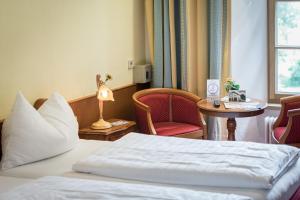 Voodi või voodid majutusasutuse Hotel Plankenhof B&B toas