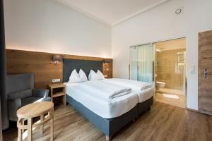 Voodi või voodid majutusasutuse Hotel Plankenhof B&B toas