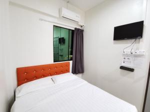 Ένα ή περισσότερα κρεβάτια σε δωμάτιο στο Lodge88 ( l l )