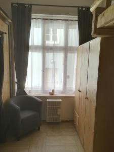 Posezení v ubytování Apartmán Pod věží I