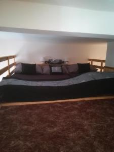 Postel nebo postele na pokoji v ubytování Apartmán Pod věží I