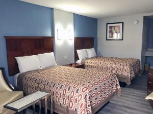 Postel nebo postele na pokoji v ubytování Americas Best Value Inn - Decatur