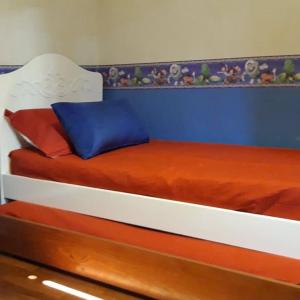 מיטה או מיטות בחדר ב-Bosque Peralta Ramos. Zorzales del Bosque
