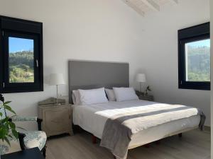 Кровать или кровати в номере Casa Paloma