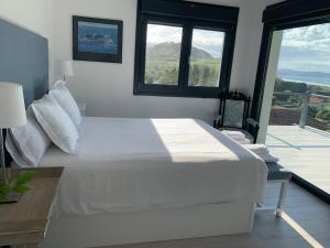 Кровать или кровати в номере Casa Paloma