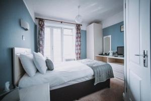 Cama o camas de una habitación en Bedford Hotel