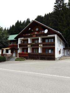 a large building with a lot of balconies on it at Ferienwohnung Riedberg in Balderschwang
