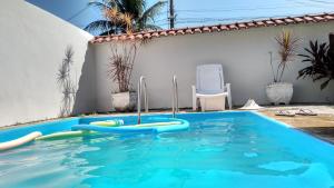 المسبح في Casa Sol de Maricá أو بالجوار