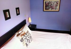 Postel nebo postele na pokoji v ubytování Spring Land Villa & 白舍青丘
