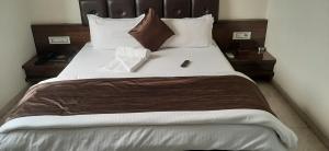 Voodi või voodid majutusasutuse Hotel Shahi Darbar toas