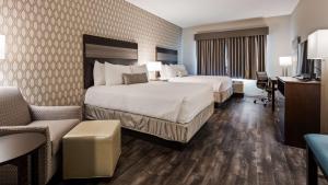 Postel nebo postele na pokoji v ubytování Best Western Plus Saint Peter