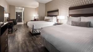 Postel nebo postele na pokoji v ubytování Best Western Plus Saint Peter