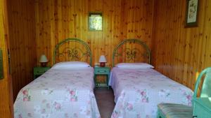 Postel nebo postele na pokoji v ubytování Camping Nube D'Argento