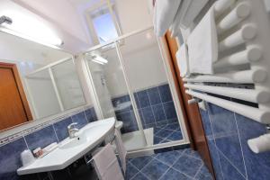 Koupelna v ubytování Hotel Frate Sole