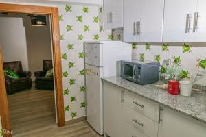 A kitchen or kitchenette at CASA LO PASTELER