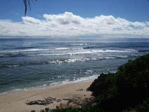 a view of the ocean with a sandy beach at Calicoan Villa in Sarog