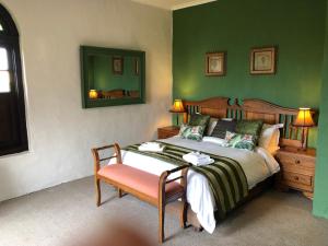 En eller flere senge i et værelse på Dio Dell Amore Guest House