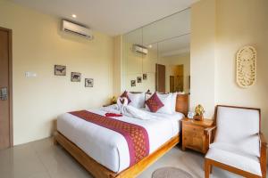 Krevet ili kreveti u jedinici u okviru objekta Ashoka Tree Resort at Tanggayuda