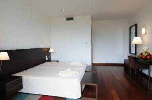 Uma cama ou camas num quarto em INATEL Vila Ruiva