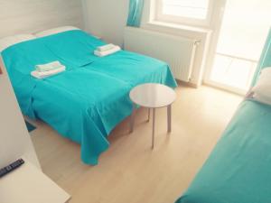 Pokoje gościnne Jutrzenka客房内的一张或多张床位