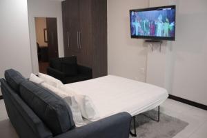 Кровать или кровати в номере Durban Suites at Oceanic