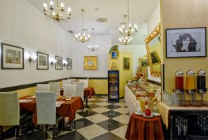 Restoranas ar kita vieta pavalgyti apgyvendinimo įstaigoje Salvator Hotel