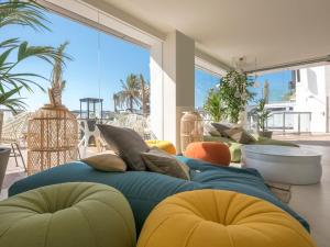 A seating area at Amàre Beach Hotel Ibiza - Adults Recommended