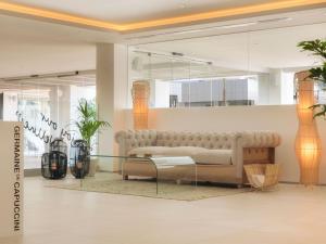 A seating area at Amàre Beach Hotel Ibiza - Adults Recommended