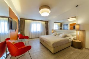 Posteľ alebo postele v izbe v ubytovaní Salvator Boutique Hotel vegan-friendly